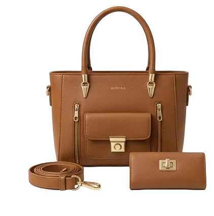 Brown handbag with matching strap and wallet on a white background