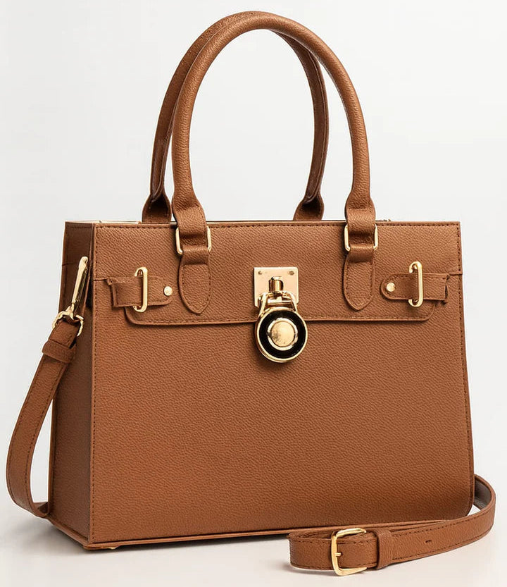 Brown handbag with gold accents on a light gray background