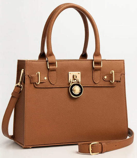 Brown handbag with gold accents on a light gray background