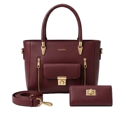 Maroon handbag with gold accents and matching wallet on a white background