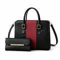 Black handbag with gold accents and a matching wallet on a white background